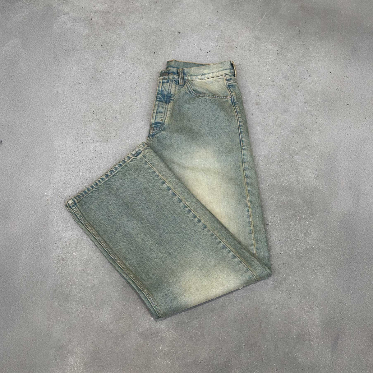 Never Human light blue loose fit jeans, detail